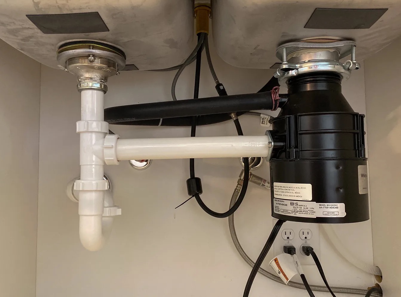 Leaky Garbage Disposal Cleanup in High Point, NC